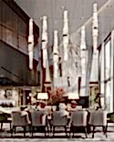 Обеденный стол Minotti с оранжевой столешницей
