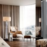 Lounge area with leather armchair and accent floor lamp