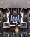The gradient on the coffee table emphasizes the combination of light and dark tones in the interior
