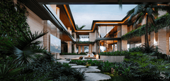 View of the inner courtyard with an open lounge area featuring a fireplace